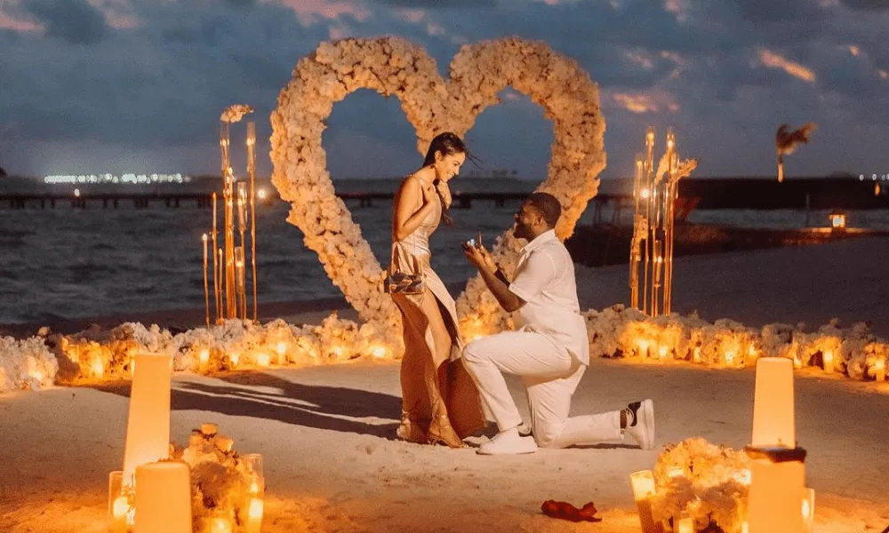 A proposal in Bali with candles and heart decor
