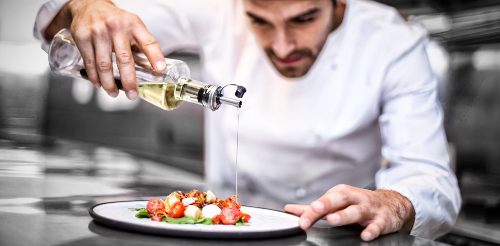 A chef preparing a Michelin Star level meal