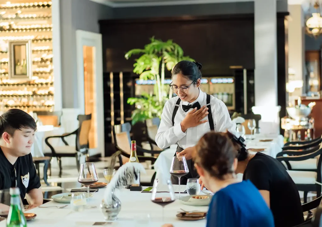 Gay friendly fine dining Bali restaurant with elegant service, wine, and upscale atmosphere for couples.